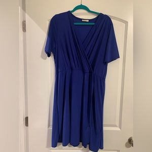 Blue dress, knee length.